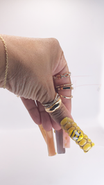 Extra-long, square press-on nails with a honeybee theme. The thumb features a completely 3D hand-sculpted yellow honeycomb texture with a small painted black and yellow bumblebee on top